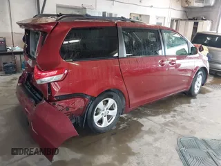 2012 Toyota Sienna LE AAS with VIN 5TDKK3DC5CS277303, listed as a IAAI auction lot 42162586 with 128,656 mi miles and . Bid and sale history available at DreamBid. Image 4.
