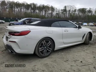 2019 BMW 8 Series M850i xDrive z VIN WBAFY4C57KBX29392, wystawiony jako Copart lot #51654905 z przebiegiem 83 651 mil mil oraz Szkody całkowita. Historia ofert i sprzedaży dostępna na DreamBid. Obrazek 3.