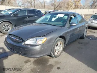 2002 Ford Taurus SEL with VIN 1FAFP56S52A207465, listed as a IAAI auction lot 41218559 with 170,003 mi miles. Bid and sale history available at carsss.com. Image 2.