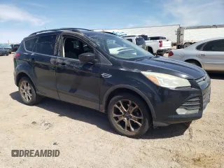 2013 Ford Escape SE with VIN 1FMCU0GX6DUB82060, listed as a Copart auction lot 50173005 with 149,216 mi miles and Salvage Title. Bid and sale history available at DreamBid. Image 4.