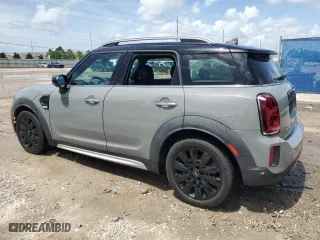 2021 MINI Countryman Oxford Edition with VIN WMZ23BR08M3M79321, listed as a Copart auction lot 70573014 with 49,718 mi miles and Non Repairable. Bid and sale history available at carsss.com. Image 2.