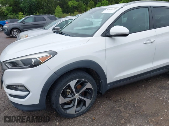 2016 Hyundai Tucson Limited with VIN KM8J33A23GU215481, listed as a IAAI auction lot 42202341 with 97,693 mi miles. Bid and sale history available at carsss.com. Image 17.
