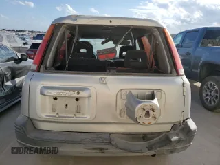 1999 Honda CR-V LX with VIN JHLRD2848XC011581, listed as a Copart auction lot 77183294 with 218,474 mi miles and Salvage Title. Bid and sale history available at carsss.com. Image 6.