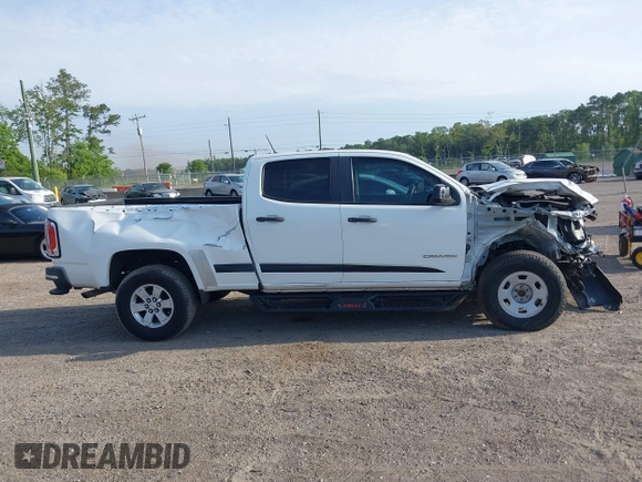 2015 GMC Canyon 2WD with VIN 1GTG5AE34F1131864, listed as a IAAI auction lot 41760611 with 169,187 mi miles and . Bid and sale history available at DreamBid. Image 13.