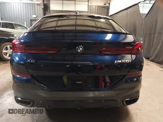 2022 BMW X6 M50i z VIN 5UXCY8C05N9J70601, wystawiony jako IAAI lot #42344397 z przebiegiem 49 085 mil mil oraz . Historia ofert i sprzedaży dostępna na DreamBid. Obrazek 16.