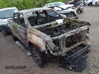 2022 GMC Canyon 4WD Denali z VIN 1GTG6EEN0N1293768, wystawiony jako IAAI lot #42121028 z przebiegiem 6 mil mil oraz . Historia ofert i sprzedaży dostępna na DreamBid. Obrazek 1.