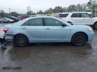 2007 Toyota Camry CE with VIN 4T1BE46K57U714232, listed as a IAAI auction lot 41963018 with 143,777 mi miles. Bid and sale history available at carsss.com. Image 13.