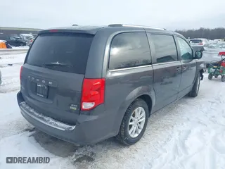 2018 Dodge Grand Caravan SXT with VIN 2C4RDGCG2JR325737, listed as a IAAI auction lot 41610173 with 97,492 mi miles. Bid and sale history available at carsss.com. Image 4.