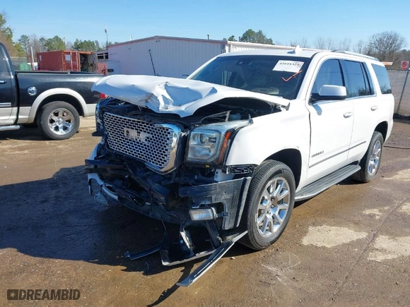 2016 GMC Yukon Denali with VIN 1GKS2CKJ7GR476072, listed as a IAAI auction lot 41611329 with 152,052 mi miles. Bid and sale history available at carsss.com. Image 6.