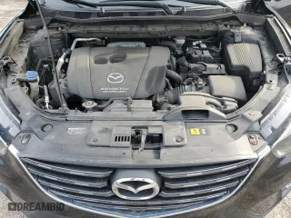 2016 Mazda CX-5 Touring with VIN JM3KE4CY7G0860868, listed as a Copart auction lot 51203415 with 86,768 mi miles and Salvage Title. Bid and sale history available at carsss.com. Image 13.