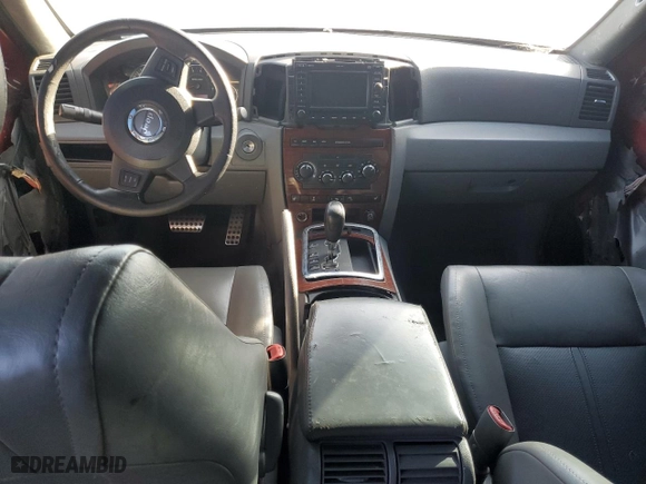 2007 Jeep Grand Cherokee SRT-8 with VIN 1J8HR78347C617760, listed as a Copart auction lot 77800304 with 0 mi miles and Salvage Title. Bid and sale history available at carsss.com. Image 8.