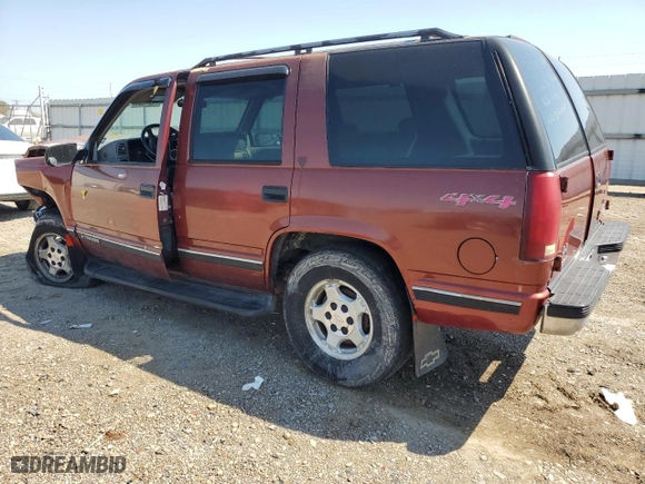 1999 Chevrolet Tahoe Z71 with VIN 1GNEK13R0XJ474557, listed as a Copart auction lot 74971964 with 217,027 mi miles and Salvage Title. Bid and sale history available at carsss.com. Image 2.