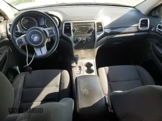 2012 Jeep Grand Cherokee Laredo with VIN 1C4RJEAG1CC334201, listed as a Copart auction lot 83696774 with 208,639 mi miles and Clean Title. Bid and sale history available at carsss.com. Image 8.