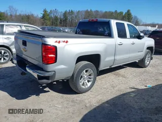 2018 Chevrolet Silverado 1500 LT with VIN 1GCVKREH4JZ323242, listed as a IAAI auction lot 41971945 with 63,915 mi miles and . Bid and sale history available at DreamBid. Image 4.