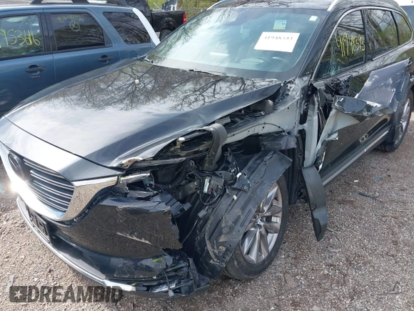 2020 Mazda CX-9 Grand Touring with VIN JM3TCBDY3L0419049, listed as a IAAI auction lot 41948393 with 70,163 mi miles and . Bid and sale history available at DreamBid. Image 6.
