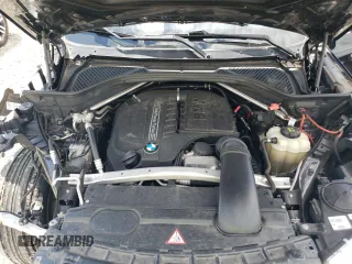 2016 BMW X5 xDrive35i z VIN 5UXKR0C52G0P26716, wystawiony jako Copart lot #56028275 z przebiegiem 128 355 mil mil oraz Szkoda całkowita • Salvage title. Historia ofert i sprzedaży dostępna na DreamBid. Obrazek 12.