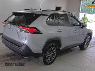 2022 Toyota RAV4 Hybrid XLE Premium with VIN 4T3B6RFV5NU085564, listed as a IAAI auction lot 42854215 with 49,616 mi miles and . Bid and sale history available at DreamBid. Image 16.