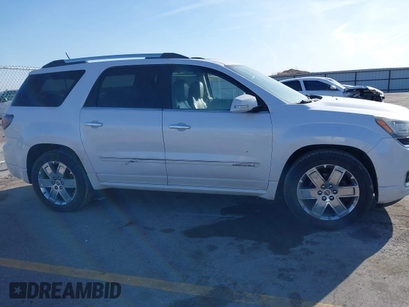 2016 GMC Acadia Denali with VIN 1GKKVTKD3GJ221449, listed as a IAAI auction lot 41777230 with 157,699 mi miles and . Bid and sale history available at DreamBid. Image 13.