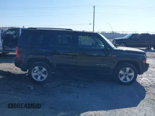 2011 Jeep Patriot Sport with VIN 1J4NT1GA2BD103234, listed as a IAAI auction lot 41976351 with 151,208 mi miles and . Bid and sale history available at carsss.com. Image 13.
