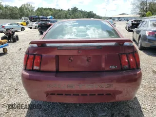 2004 Ford Mustang Standard with VIN 1FAFP40674F136300, listed as a Copart auction lot 86332804 with 163,996 mi miles and Salvage Title. Bid and sale history available at carsss.com. Image 6.