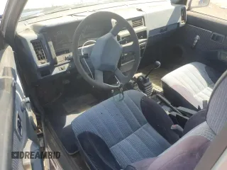 1992 Nissan Frontier SE z VIN 1N6HD16Y8NC358458, wystawiony jako Copart lot #62064905 z przebiegiem 226 678 mil mil oraz Czysty tytuł • Clean title. Historia ofert i sprzedaży dostępna na DreamBid. Obrazek 8.