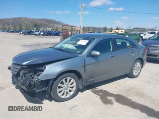 2010 Chrysler Sebring Limited with VIN 1C3CC5FB2AN207816, listed as a IAAI auction lot 41977487 with 130,052 mi miles and . Bid and sale history available at DreamBid. Image 2.