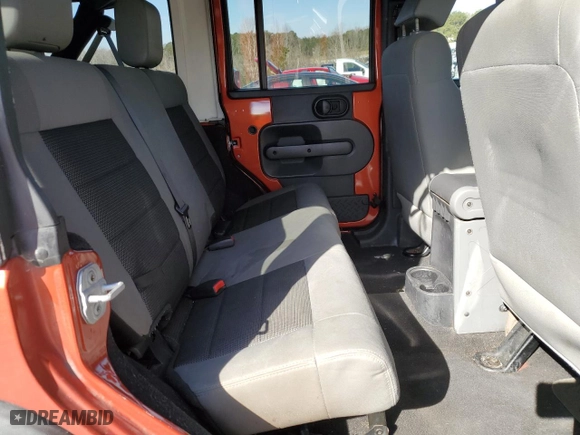 2009 Jeep Wrangler Unlimited X with VIN 1J4GA39199L741987, listed as a Copart auction lot 42649235 with 217,448 mi miles and Salvage Title. Bid and sale history available at carsss.com. Image 12.