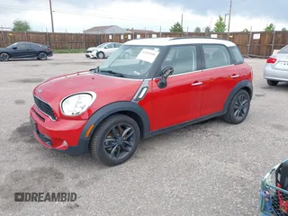 2013 MINI Countryman S with VIN WMWZC3C57DWP21892, listed as a IAAI auction lot 42402600 with 59,700 mi miles and . Bid and sale history available at DreamBid. Image 2.