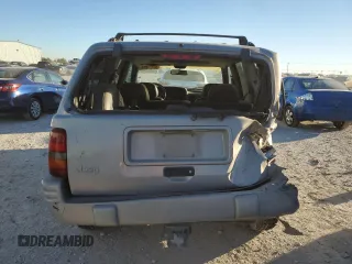 1998 Jeep Grand Cherokee with VIN 1J4FX48S4WC345469, listed as a Copart auction lot 80721224 with 201,543 mi miles and Salvage title. Bid and sale history available at DreamBid. Image 6.