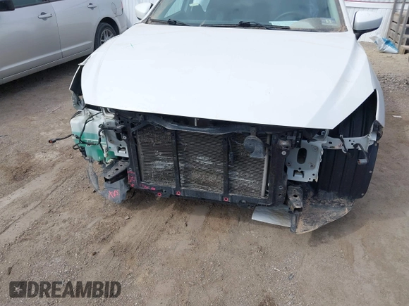 2014 Mazda 3 i Touring with VIN JM1BM1L75E1100432, listed as a IAAI auction lot 41897584 with 149,628 mi miles and . Bid and sale history available at DreamBid. Image 6.