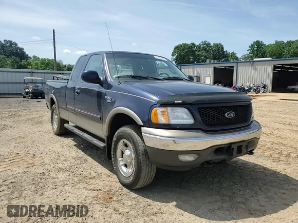 2002 Ford F-150 XL with VIN 1FTRX18L62NA69837, listed as a Copart auction lot 61581935 with 130,078 mi miles and Salvage title. Bid and sale history available at DreamBid. Image 13.