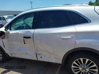 2016 Lincoln MKC Reserve with VIN 5LMTJ3DH5GUJ00697, listed as a IAAI auction lot 42519804 with 57,995 mi miles and . Bid and sale history available at DreamBid. Image 6.