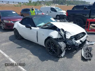 2016 Mazda MX-5 Miata Club z VIN JM1NDAC75G0113400, wystawiony jako IAAI lot #42143080 z przebiegiem 48 579 mil mil oraz . Historia ofert i sprzedaży dostępna na DreamBid. Obrazek 1.