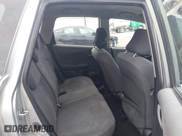 2013 Honda Fit with VIN JHMGE8H38DC002109, listed as a IAAI auction lot 42067257 with 305,739 mi miles. Bid and sale history available at carsss.com. Image 8.