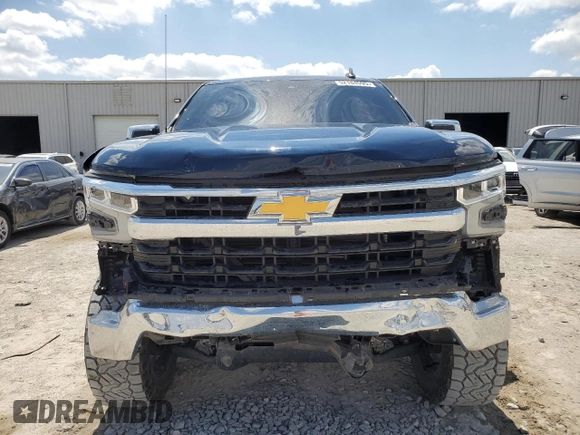 2023 Chevrolet Silverado 1500 LT with VIN 3GCPACEK0PG227265, listed as a Copart auction lot 52184595 with 17,666 mi miles and Salvage Title. Bid and sale history available at DreamBid. Image 5.