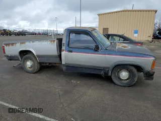 1989 Dodge Dakota S with VIN 1B7GL26X9KS129335, listed as a Copart auction lot 82744003 with 174,152 mi miles and Salvage Title. Bid and sale history available at carsss.com. Image 4.