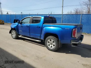 2018 GMC Canyon 4WD SLE z VIN 1GTG6CEN0J1262745, wystawiony jako Copart lot #54671585 z przebiegiem Nie podano mil oraz Szkoda całkowita • Salvage title. Historia ofert i sprzedaży dostępna na DreamBid. Obrazek 2.