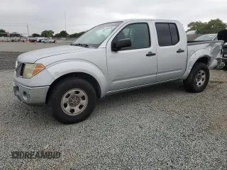 2007 Nissan Frontier SE z VIN 1N6AD07UX7C435647, wystawiony jako Copart lot #59967955 z przebiegiem 153 902 mil mil oraz Szkoda całkowita • Salvage title. Historia ofert i sprzedaży dostępna na DreamBid. Obrazek 1.