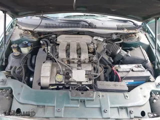 1999 Ford Taurus SE with VIN 1FAFP53S5XA102534, listed as a IAAI auction lot 41740212 with 154,926 mi miles. Bid and sale history available at carsss.com. Image 10.