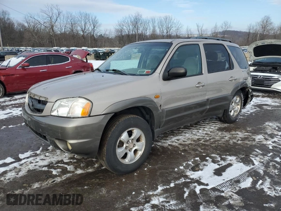 2001 Mazda Tribute LX with VIN 4F2CU081X1KM70119, listed as a Copart auction lot 89311935 with 176,851 mi miles and Salvage Title. Bid and sale history available at DreamBid. Image 1.