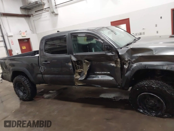 2017 Toyota Tacoma SR5 with VIN 3TMDZ5BN8HM016825, listed as a IAAI auction lot 41658400 with 166,098 mi miles. Bid and sale history available at carsss.com. Image 13.