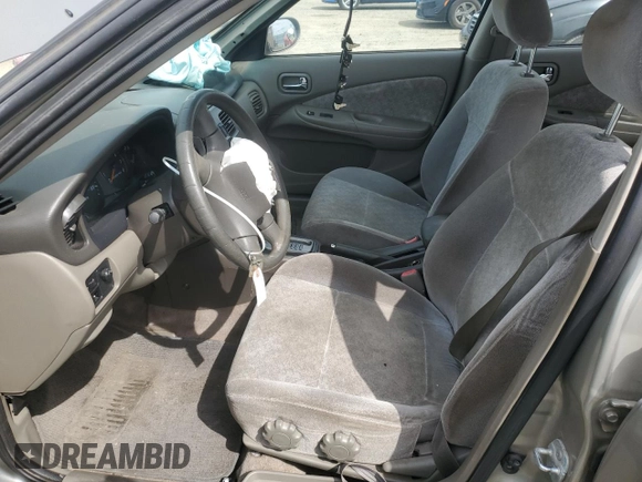 2003 Nissan Sentra XE with VIN 3N1CB51D33L782228, listed as a Copart auction lot 52156095 with 229,278 mi miles and Salvage Title. Bid and sale history available at DreamBid. Image 7.