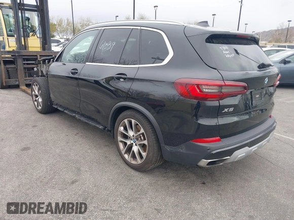 2022 BMW X5 xDrive45e with VIN 5UXTA6C08N9K85766, listed as a IAAI auction lot 41461039 with 95,003 mi miles. Bid and sale history available at carsss.com. Image 3.