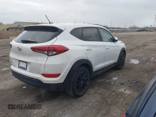 2017 Hyundai Tucson SE with VIN KM8J23A49HU297707, listed as a IAAI auction lot 41257353 with 164,687 mi miles. Bid and sale history available at carsss.com. Image 4.