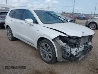 2022 Cadillac XT6 Premium Luxury with VIN 1GYKPCRS2NZ161800, listed as a IAAI auction lot 42174382 with 45,746 mi miles and . Bid and sale history available at DreamBid. Image 1.