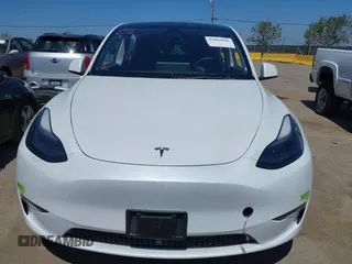 2023 Tesla Model Y Long Range with VIN 7SAYGDEE1PF660444, listed as a IAAI auction lot 42065046 with 23,601 mi miles and . Bid and sale history available at DreamBid. Image 13.