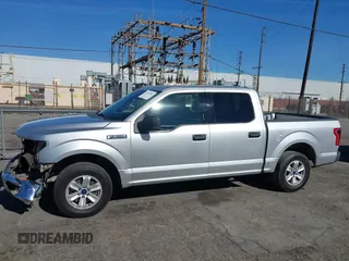 2015 Ford F-150 XLT with VIN 1FTEW1C8XFKE17196, listed as a IAAI auction lot 41414904 with 150,866 mi miles and . Bid and sale history available at carsss.com. Image 14.