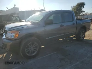 2015 Nissan Titan SV with VIN 1N6AA0EC5FN501124, listed as a Copart auction lot 87291164 with 195,448 mi miles and Salvage title. Bid and sale history available at DreamBid. Image 1.