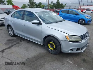 2013 Volkswagen Jetta Sedan SE with VIN 3VWDP7AJ5DM292211, listed as a IAAI auction lot 42129945 with 103,705 mi miles. Bid and sale history available at carsss.com. Image 1.