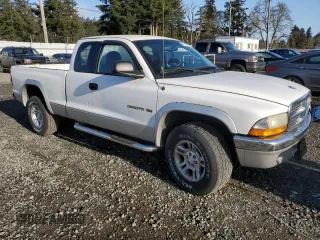 2001 Dodge Dakota Sport with VIN 1B7GG22N71S303684, listed as a Copart auction lot 52167635 with 151,354 mi miles and Salvage Title. Bid and sale history available at carsss.com. Image 4.